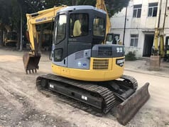 2021 Komatsu PC78US crawler excavator, rear three-quarter view 2021 Komatsu PC78US crawler excavator, rear three-quarter view