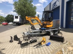 Berger Kraus BK1700JS mini excavator on trailer with attachments Berger Kraus BK1700JS mini excavator on trailer with attachments
