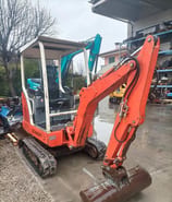 2001 Schaeff HR13 mini excavator, rear three-quarter view 2001 Schaeff HR13 mini excavator, rear three-quarter view