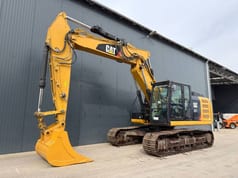 2012 Caterpillar 323EL crawler excavator, side view 2012 Caterpillar 323EL crawler excavator, side view