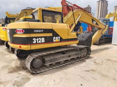 2015 Caterpillar 312B crawler excavator, rear three-quarter view 2015 Caterpillar 312B crawler excavator, rear three-quarter view