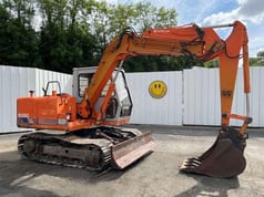 1990 Hitachi EX60 crawler excavator, side profile view 1990 Hitachi EX60 crawler excavator, side profile view