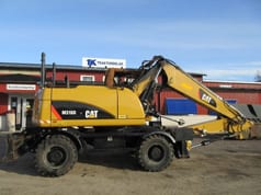 Caterpillar M316D wheel excavator, side view Caterpillar M316D wheel excavator, side view