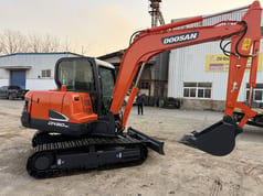 2023 Doosan DX60-9C crawler excavator, side view
