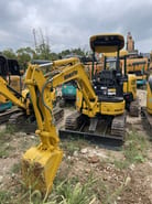 2022 Komatsu PC20MR-3 mini excavator, front three-quarter view