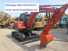 2024 Doosan DX60 mini excavator, side view 2024 Doosan DX60 mini excavator, side view