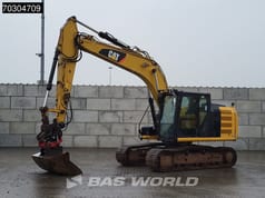 2015 Caterpillar 318EL crawler excavator, side profile view
