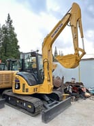 2024 Komatsu PC-55MR mini excavator, front three-quarter view
