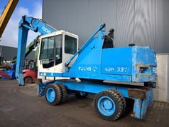 2002 Fuchs MHL331C material handler, side view