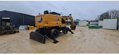 2021 Caterpillar MH3022-07 wheel excavator rear view