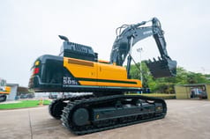 2026 Hyundai HX505L crawler excavator, rear three-quarter view