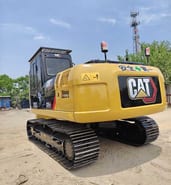 Caterpillar 320GC crawler excavator, rear three-quarter view