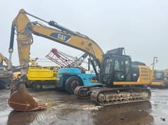 2012 Caterpillar 329E crawler excavator side view