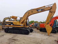 2012 Caterpillar 320BL crawler excavator side view