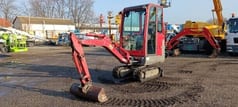 2017 Volvo EC15D mini excavator, front three-quarter view