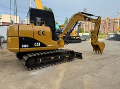 2016 Caterpillar 306D mini excavator, side profile view