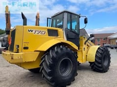 2007 New Holland W170 wheel loader, rear three-quarter view