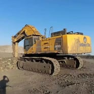 2022 Komatsu PC850 SE crawler excavator, rear three-quarter view 2022 Komatsu PC850 SE crawler excavator, rear three-quarter view