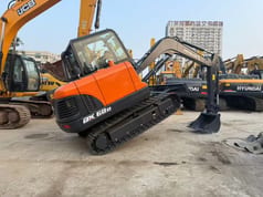 2025 Doosan DX60D-10 crawler excavator, side view