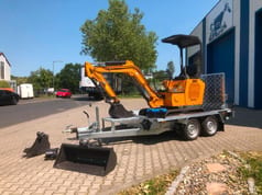 2026 Berger Kraus BK1500JS mini excavator on trailer, side view