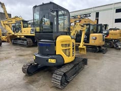 2022 Komatsu 35MR mini excavator rear three-quarter view