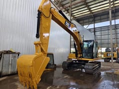 2023 Caterpillar 320GC crawler excavator, side profile view