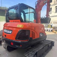 2020 Doosan DX60 crawler excavator, rear three-quarter view 2020 Doosan DX60 crawler excavator, rear three-quarter view