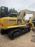 2019 Komatsu PC130 crawler excavator, rear three-quarter view 2019 Komatsu PC130 crawler excavator, rear three-quarter view