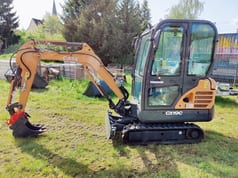 2022 CASE CX19C mini excavator, side view 2022 CASE CX19C mini excavator, side view