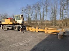 2000 Liebherr A316 wheel excavator side view 2000 Liebherr A316 wheel excavator side view