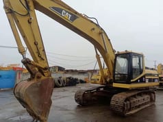 2007 Caterpillar 325BL crawler excavator, side view 2007 Caterpillar 325BL crawler excavator, side view