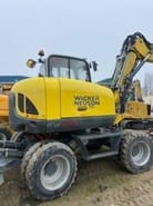 2020 Wacker Neuson EW100 wheel excavator, side view