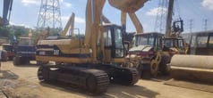 2016 Caterpillar 320BL crawler excavator, side view 2016 Caterpillar 320BL crawler excavator, side view