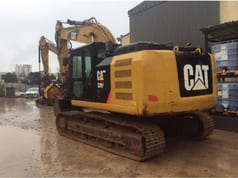 2016 Caterpillar 320F crawler excavator, rear three-quarter view