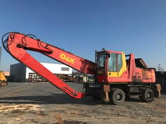 2000 O&K MH 6.5 wheel excavator, side profile view