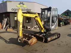 2011 Wacker Neuson 2404RD mini excavator, front three-quarter view