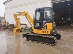 2015 Komatsu PC55MR-2 mini excavator, side view 2015 Komatsu PC55MR-2 mini excavator, side view