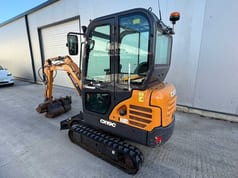 2022 CASE CX19C mini excavator, rear three-quarter view
