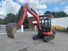 2014 Kubota KX121-3 ALPHA mini excavator, side view 2014 Kubota KX121-3 ALPHA mini excavator, side view