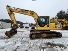 2011 Komatsu PC210LC-8 crawler excavator side view 2011 Komatsu PC210LC-8 crawler excavator side view