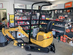 2022 Caterpillar 300.9D mini excavator, side view 2022 Caterpillar 300.9D mini excavator, side view