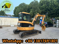 2010 Caterpillar 304CCR mini excavator, rear three-quarter view