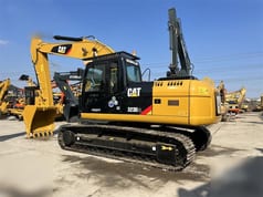 2020 Caterpillar 323D2L crawler excavator, rear three-quarter view 2020 Caterpillar 323D2L crawler excavator, rear three-quarter view