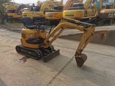 2023 Komatsu PC10MR mini excavator, side view