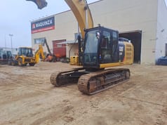 2018 Caterpillar 323F crawler excavator, front three-quarter view