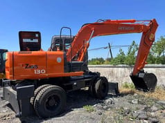 2023 Hitachi Zaxis 130 wheel excavator, side view