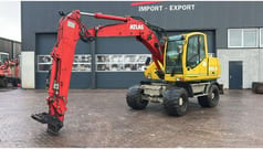 2004 Atlas 1305 M wheel excavator, side view 2004 Atlas 1305 M wheel excavator, side view