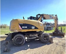 2009 Caterpillar M318D wheel excavator, side profile view 2009 Caterpillar M318D wheel excavator, side profile view