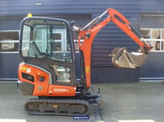 2015 Kubota KX019-4 mini excavator, side view 2015 Kubota KX019-4 mini excavator, side view