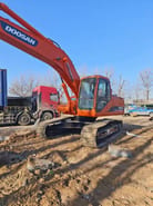 2023 Doosan DH225LC-7 crawler excavator, side view